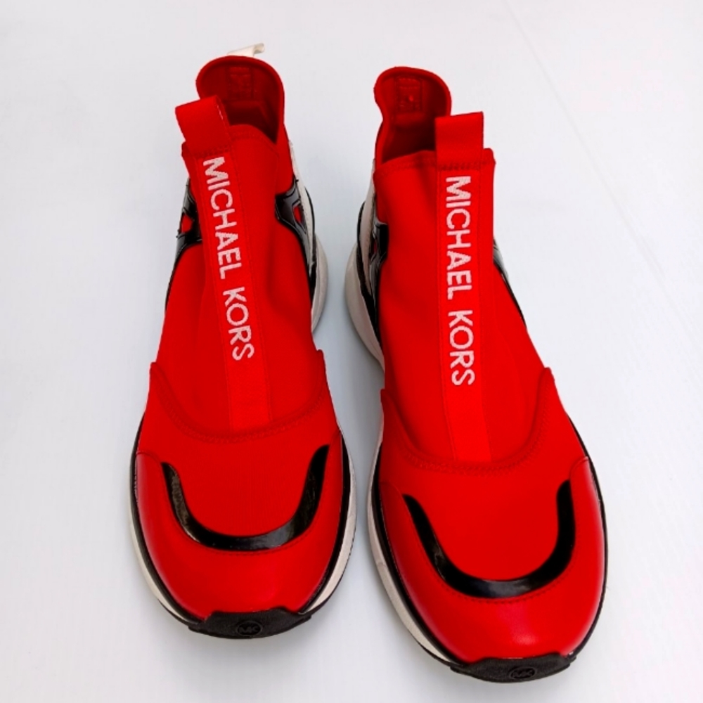Michael Kors sneaker size 10 brand new never worn. Dust bag no Box